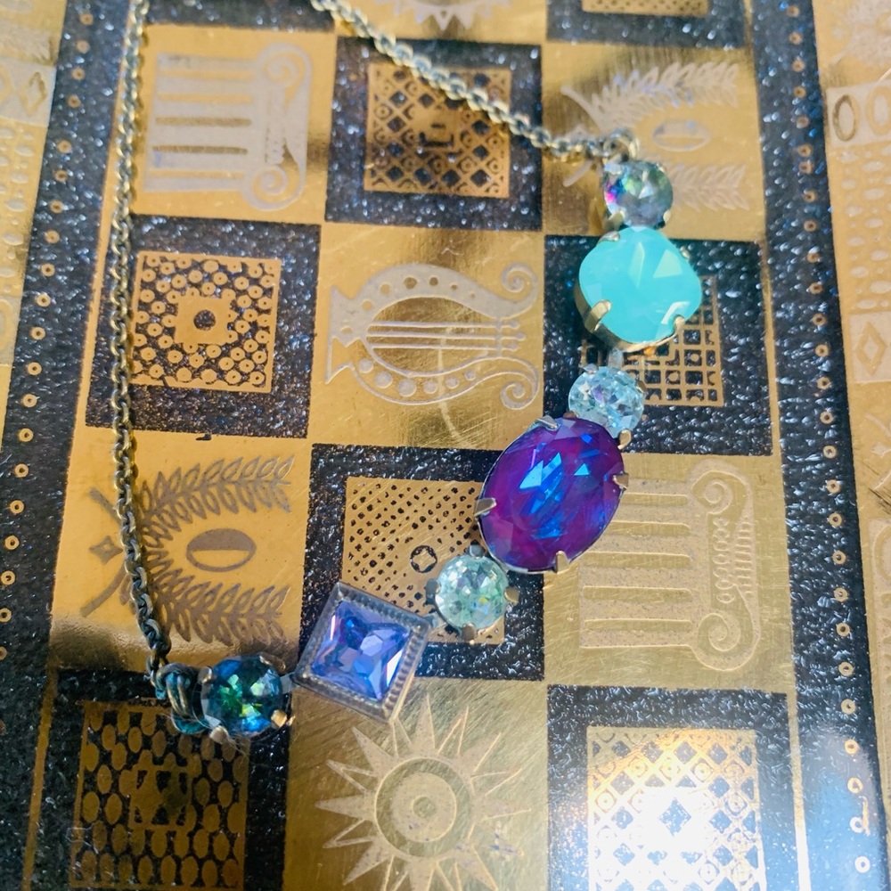 Sorrelli Swarovski Crystal bracelet set in a metal base antique gold tone slider
